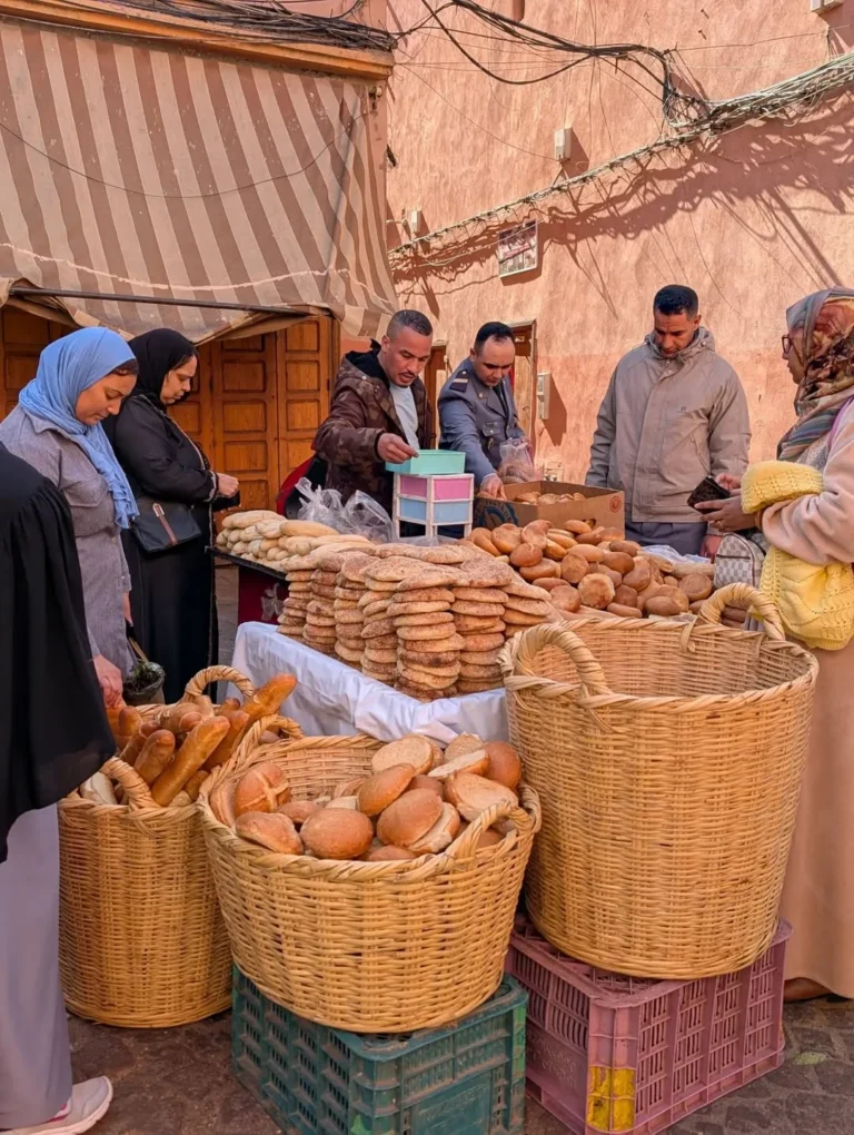 Baskets of round Moroccan bread at a stall in the medina