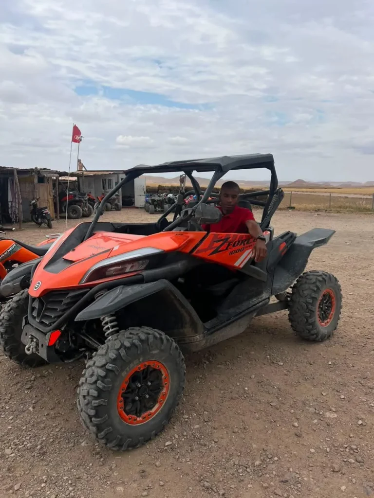 Orange off-road buggy ready to leave from a base in the Agafay desert