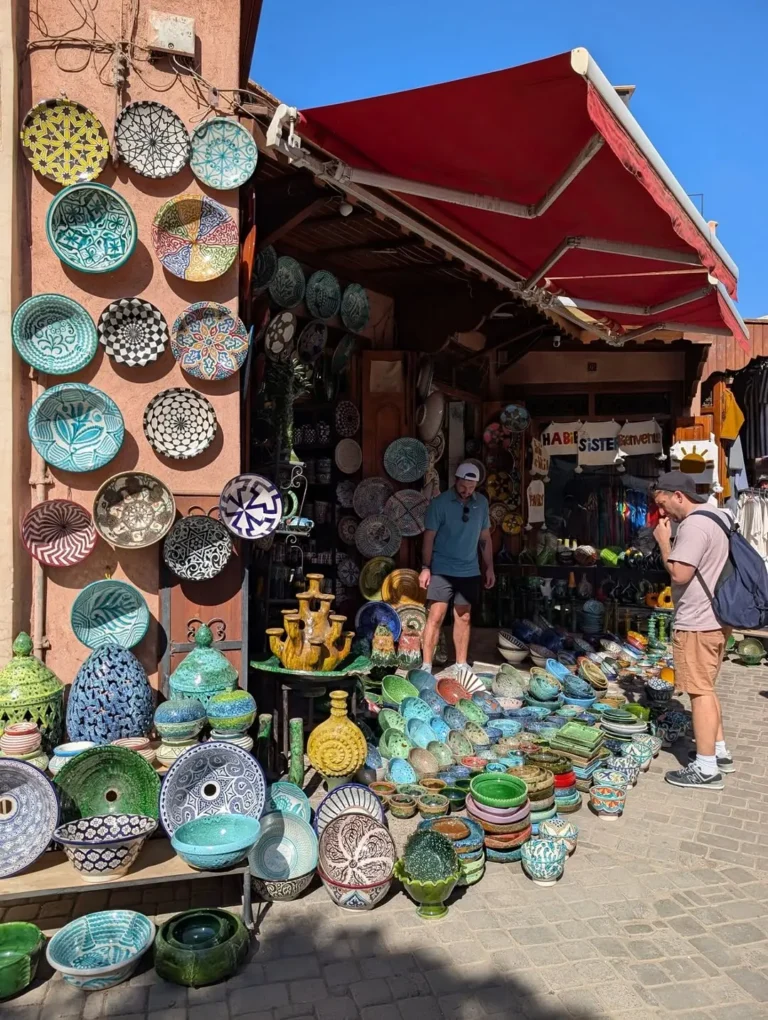 Painted ceramic bowls and plates outside a souk shop